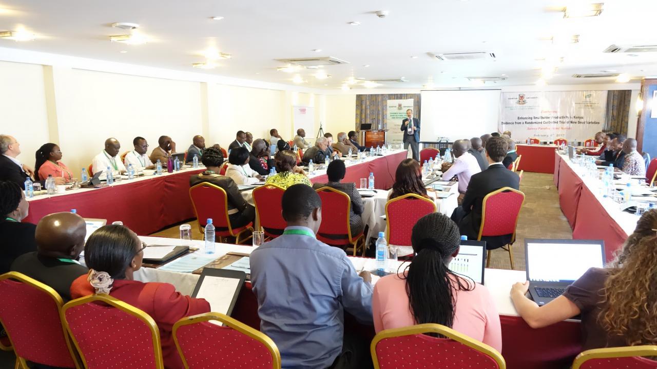 Michael Carter gives a talk on increasing maize productivity in Kenya conference presentation